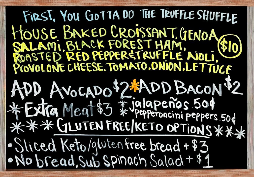 "First, You Gotta Do The Truffle Shuffle"  Happy Friday! The Special Sandwich Today is a Fresh Baked Croissant with Genoa Salami, Black Forest Ham, Provolone Cheese, Roasted Red Pepper & Truffle Aioli, Onion, Tomato and Lettuce.  $10   Add Avocado($2), Add Bacon($2), Extra Meat($3), Add Jalapeños or Pepperoncini Peppers($.50). Gluten Free/Keto Options: No Bread, Sub Spinach Salad(+$1), Sliced Keto & Gluten Free Bread(+$3)
