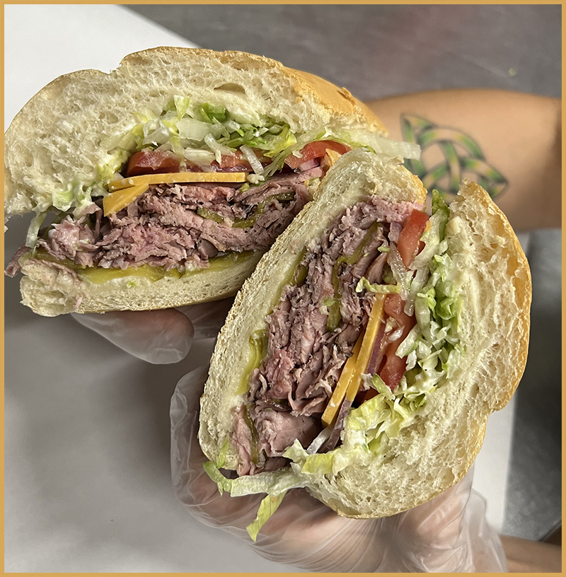 Chief Scotty - The “Scotty” has been a popular sandwich lately and we wanted to make sure you weren’t left out on knowing about it! It’s a house baked sourdough roll with horseradish, mayonnaise, pickles, a double portion of roast beef, sharp cheddar cheese, lettuce, tomato, and red onion. 