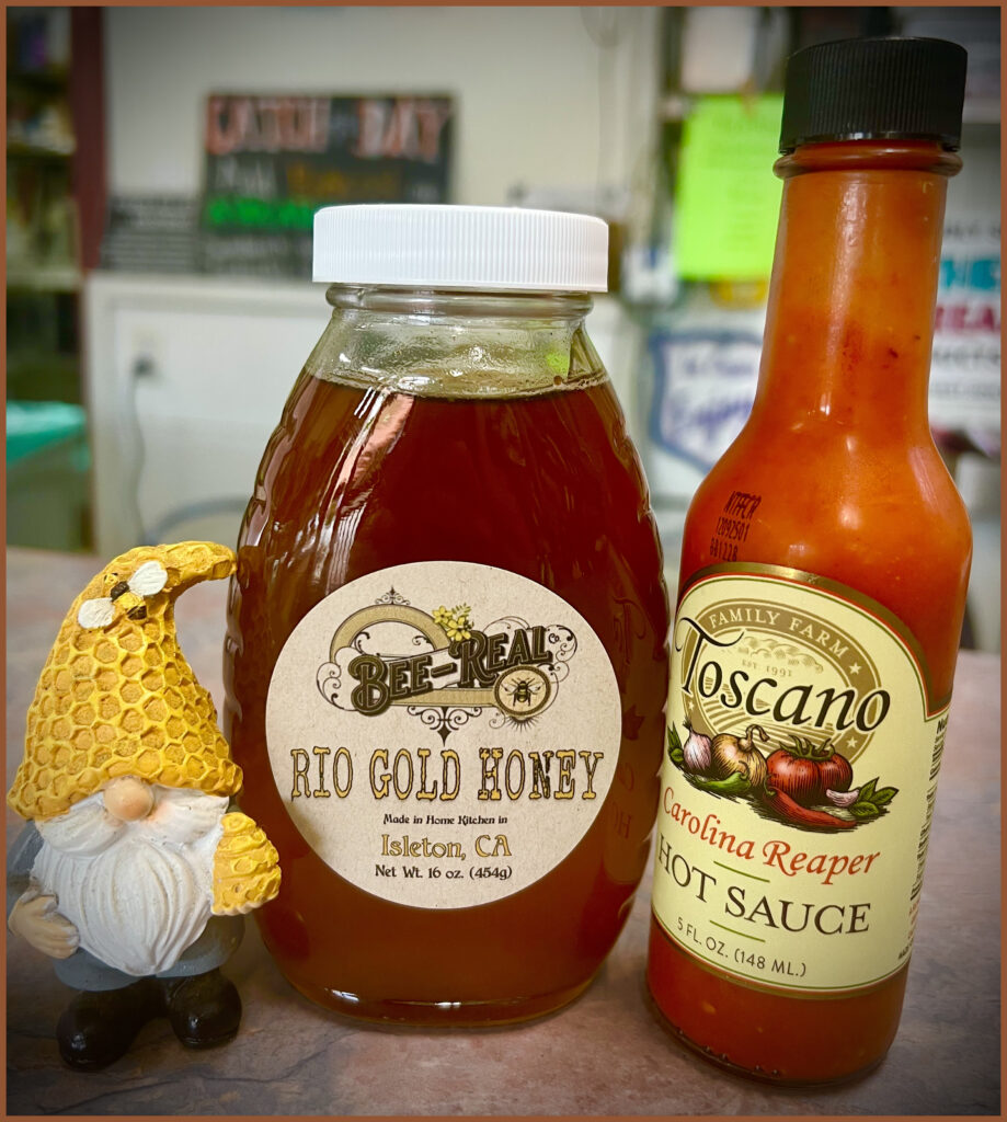 Hot Honey Sauce made with Local Bee-Real Co Honey and Local Javier Toscano Carolina Reaper Hot Sauce,