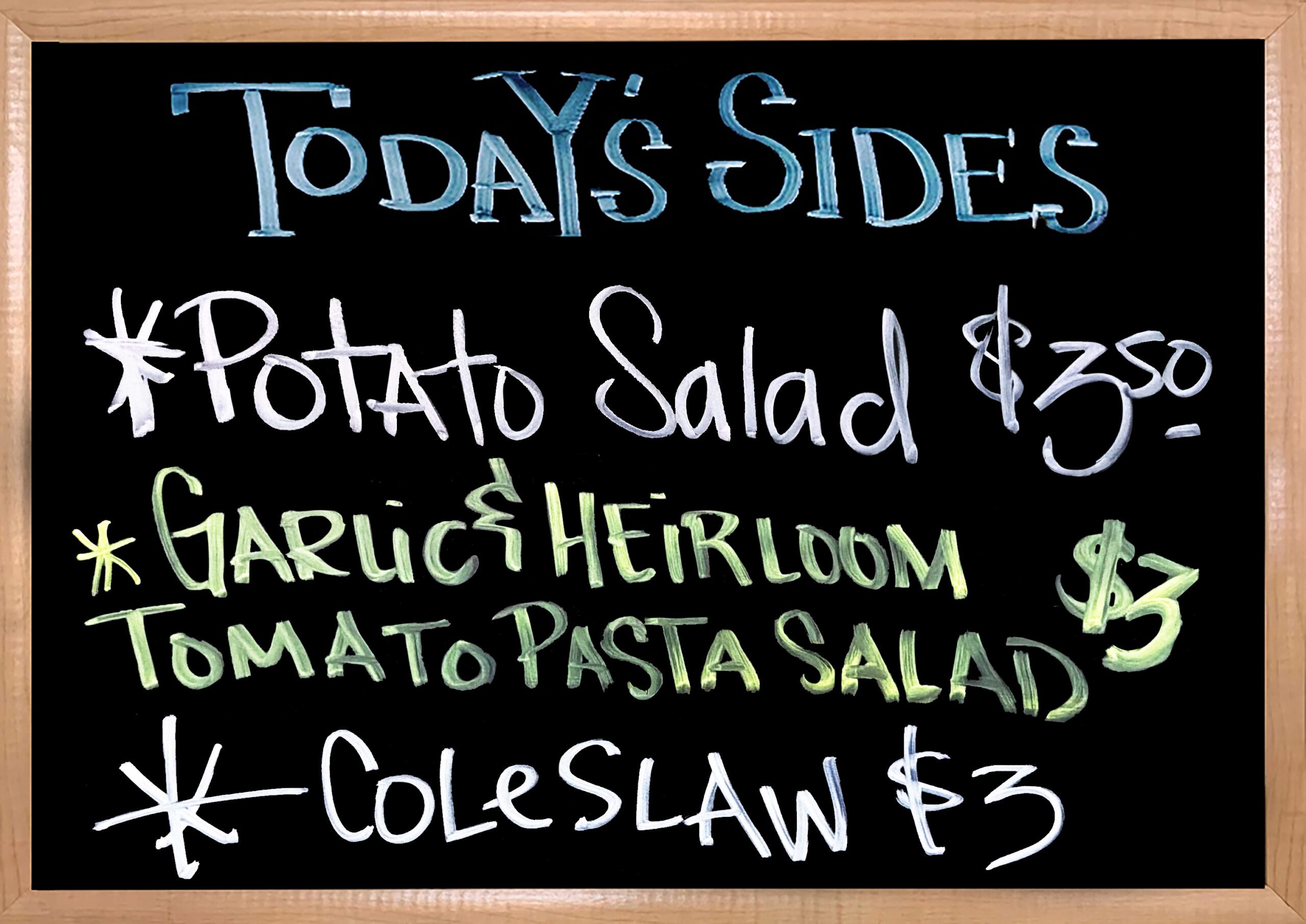 We have House Made Sides to Accompany your Sandwiches. Today’s Sides are Coleslaw, Potato Salad, and Garlic & Heirloom Tomato Pasta Salad. 